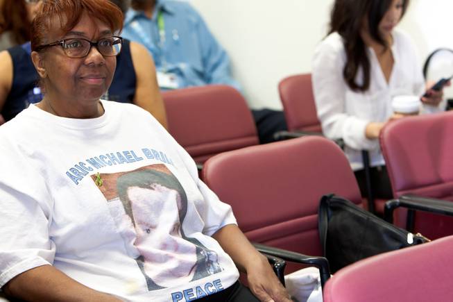 "Granny" Candace Mbaye wears a T-shirt in memory of 16-year-old Aric Michael Brill, who donated six organs following his homicide five years ago, during a ceremony at the UMC Transplant Center Friday, February 21, 2014.  Granny used to cook Brill's favorite fried chicken for him while he frequently visited her home.