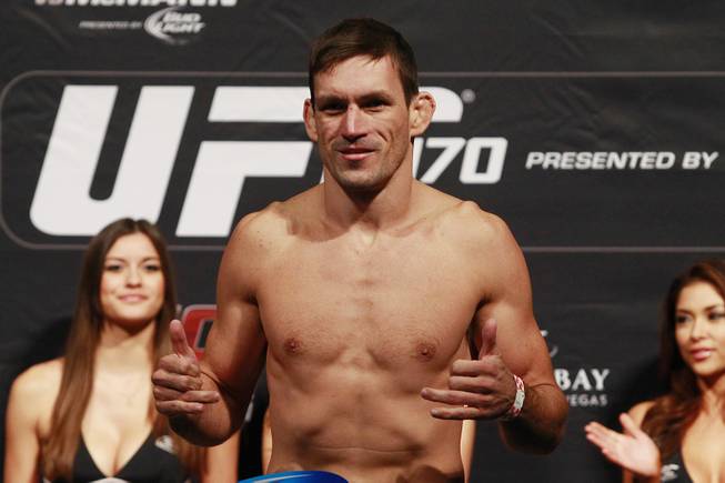 Welterweight Demian Maia reacts after making weight during the weigh in for UFC 170 Friday, Feb. 21, 2014 at the Mandalay Bay Events Center.