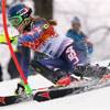 Mikaela Shiffrin of the United States skis past a gate during the women's slalom at the Sochi 2014 Winter Olympics, Friday, Feb. 21, 2014, in Krasnaya Polyana, Russia. Shiffrin won gold in the event.