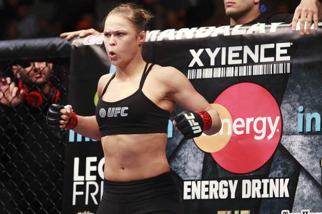 Ronda Rousey limbers up before her fight with Sara McMann at UFC 170 Saturday, Feb. 22, 2014 at the Mandalay Bay Events Center. Rousey won by TKO in the first round with a knee to the McMann's liver.