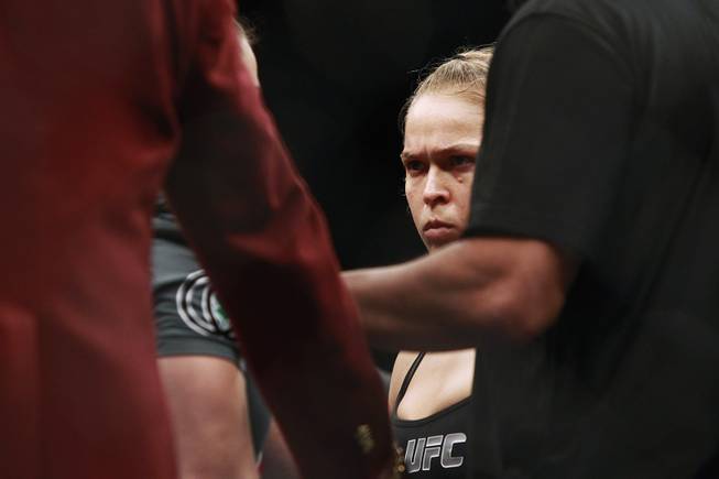 Ronda Rousey stares down Sara McMann before their fight at UFC 170 Saturday, Feb. 22, 2014 at the Mandalay Bay Events Center. Rousey won by TKO in the first round with a knee to the McMann's liver.