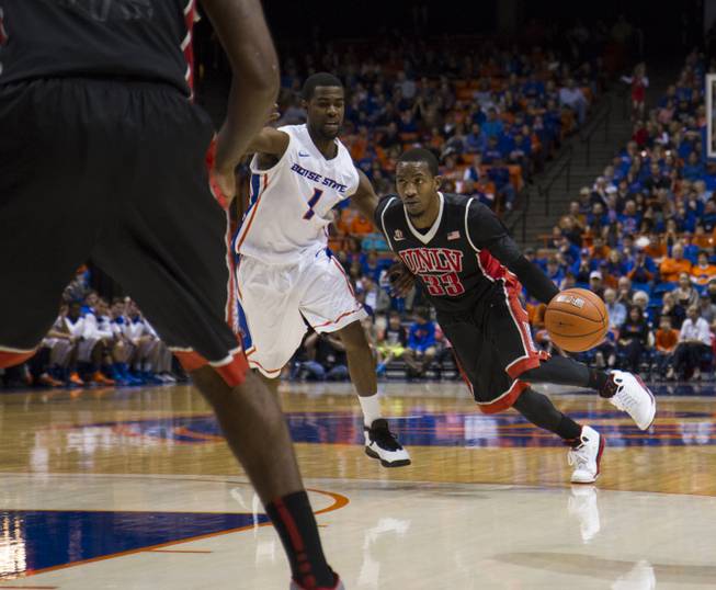 Deville Smith attacks the defense in UNLV's 91-90 overtime loss to Boise State at Taco Bell Arena in Boise on Saturday, Feb. 22, 2014.