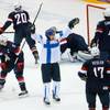 Teemu Selanne of Finland (8) celebrates his goal against Team USA during the third period of the men's bronze medal ice hockey game at the 2014 Winter Olympics, Saturday, Feb. 22, 2014, in Sochi, Russia. 