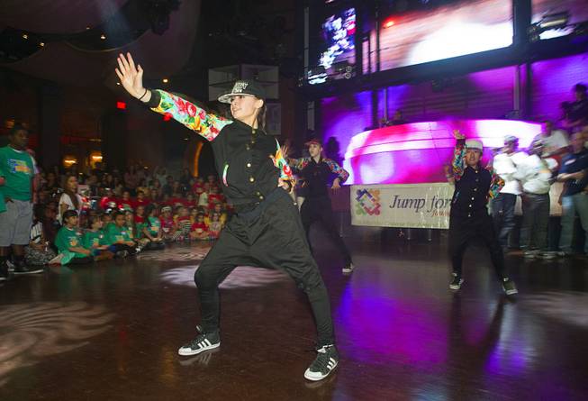 Members of the Prodigy Dance Crew perform during the second annual Dance Against Obesity Camp at the Marquee nightclub in the Cosmopolitan Las Vegas Sunday, Feb. 23, 2014. The free dance clinic was sponsored by TAO Cares and the Jump for Joy Foundation. While the children learned dance moves, parents participated in nutritional seminars.