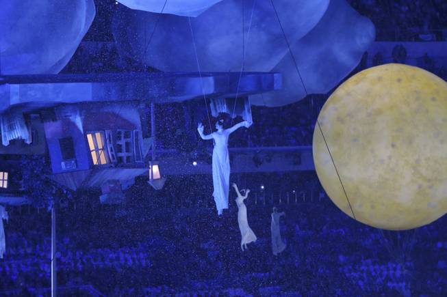 Performers create a living enactment of a painting by Marc Chagall during the closing ceremony for the 2014 Winter Olympics at Fisht Olympic Stadium in Sochi, Russia, Feb. 23, 2014. (Doug Mills/The New York Times)