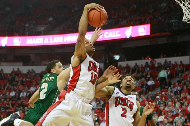 UNLV guard Bryce Dejean Jones pulls in a rebound against Colorado State during the first half of their Mountain West Conference game Wednesday, Feb. 26, 2014 at the Thomas & Mack Center.