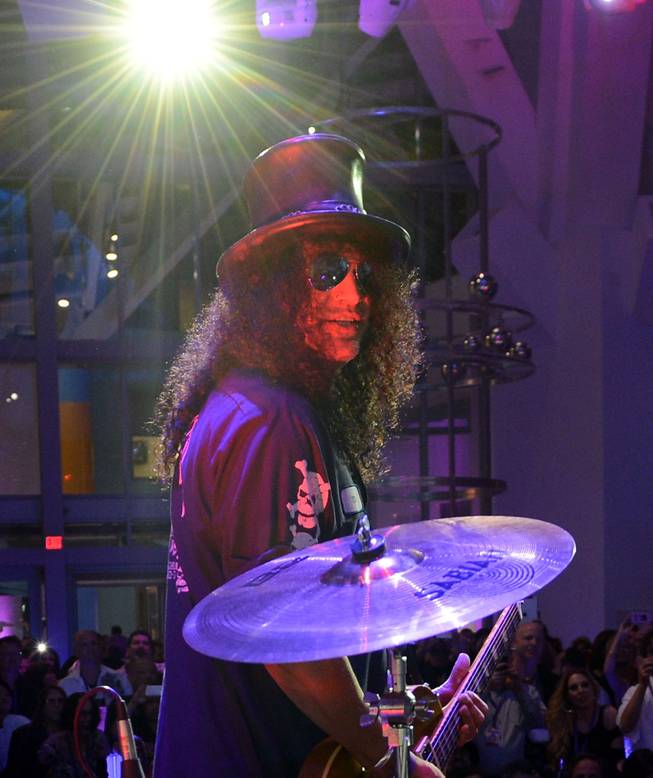 Slash performs during the Kerry Simon "Simon Says Fight MSA" benefit concert at the Keep Memory Alive Center in Las Vegas on Feb. 27, 2014.