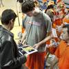 Stephen Zimmerman stops to sign a few autographs before heading to the lockerroom Thursday, Feb. 27, 2014 after Bishop Gorman defeated Reno 68-27 in the semifinals of the Nevada State Championships at Lawlor Events Center in Reno.