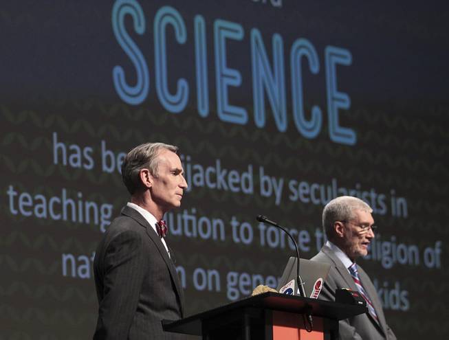  In this Feb. 4, 2014 photo, Creation Museum head Ken Ham, right, speaks during a debate on evolution with TV's "Science Guy" Bill Nye, at the Creation Museum in Petersburg, Ky. 