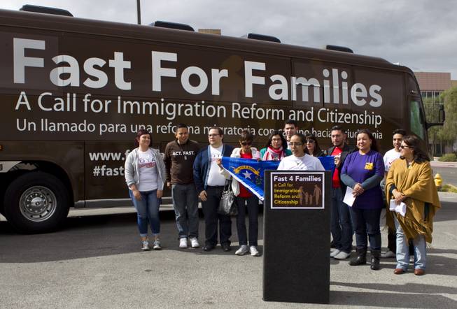 Marisol Montoya with Mi Familia Vota speaks in support of Fast for Families during their stop in downtown Henderson as part of a nationwide bus tour Friday, Feb. 28, 2014.  L.E. Baskow
