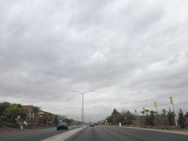 Clouds loom overhead in Henderson threatening much needed rain in the Valley Friday, Feb. 28, 2014.