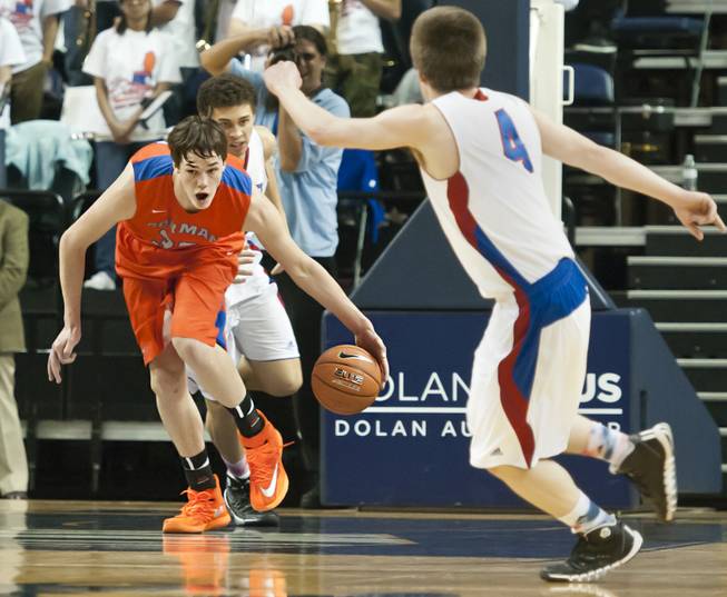 Stephen Zimmerman comes up with a rebound and looks upcourt Thursday, Feb. 27, 2014 as Bishop Gorman defeats Reno 68-27 in the semifinals of the Nevada State Championships at Lawlor Events Center in Reno.