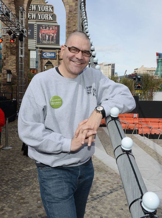 John Katsilometes after Holly Madison shaved his head in support of St. Baldrick’s Foundation’s fundraiser for childhood cancer research Saturday, March 1, 2014, at New York-New York’s Brooklyn Bridge.

