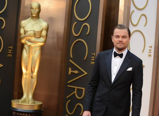 Leonardo DiCaprio arrives at the Oscars on Sunday, March 2, 2014, at the Dolby Theater in Los Angeles.