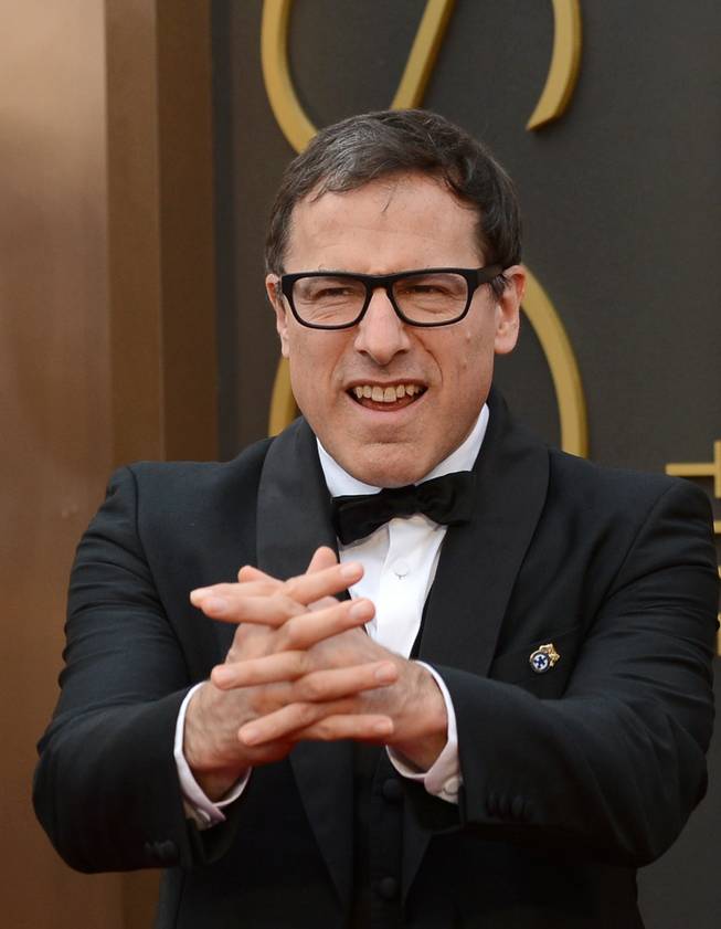 David O. Russell arrives at the Oscars on Sunday, March 2, 2014, at the Dolby Theatre in Los Angeles.  (Photo by Jordan Strauss/Invision/AP)