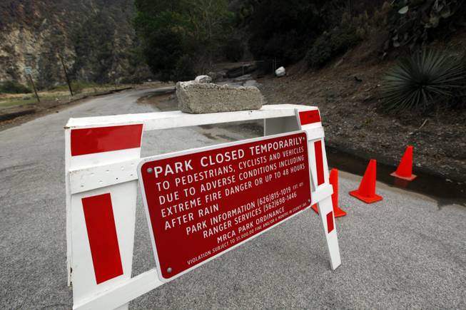 River Wilderness Park in San Gabriel Canyon is temporarily closed, one of several areas considered especially at risk in Azusa, Calif., as the city prepared for possible flooding Feb. 27, 2014. Residents of some 1,200 homes in three foothill cities were under evacuation orders due to danger of debris flows from steep slopes burned bare by recent wildfires. 