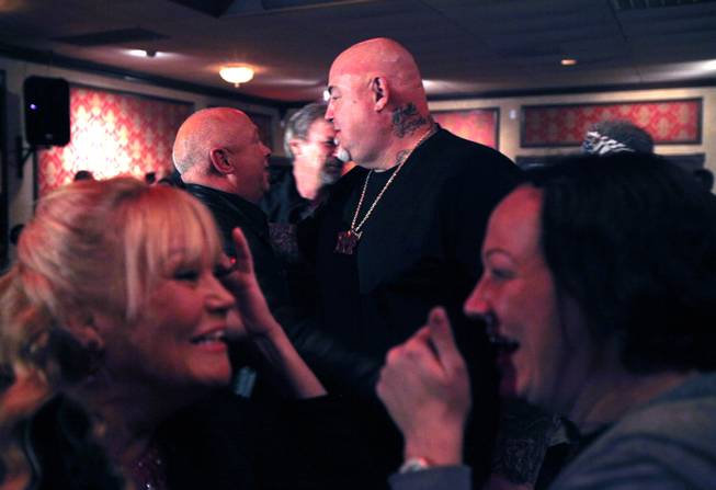 Frankie Citro threw a going-away party and fundraiser for his friend Charles "Pee-wee" Goldsmith, center, who is heading to prison for two to five years after a brawl involving his gang, the Hells Angels. Citro, who did time for racketeering, is offering Goldsmith support and advice for when he gets locked up.