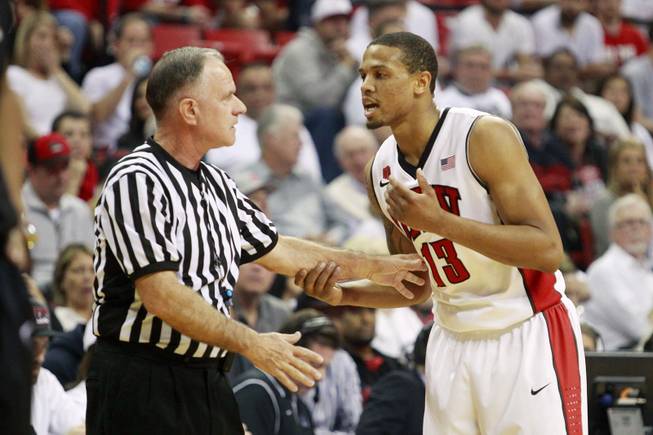 UNLV guard Bryce Dejean Jones complains to official Dick Cartmell after he was hit in the head by a San Diego State player during their Mountain West Conference game Wednesday, March 5, 2014, at the Thomas & Mack Center. The Aztecs won 73-64.
