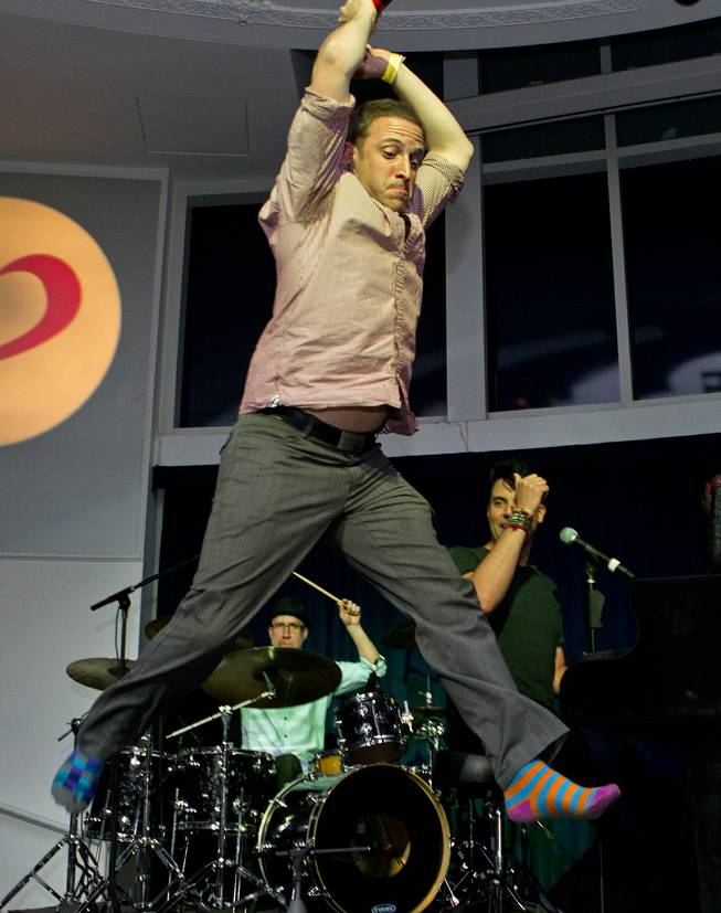 Martin Kaye leaps during his big finish at Las Vegas Weekly's Unscripted Party featuring Stifler in the Havana Room on Tuesday, March 4, 2014, at the Tropicana.