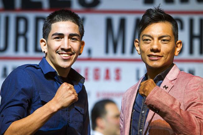 WBC super bantam weight champion Leo Santa Cruz, left, of Mexico and Cristian Mijares, also of Mexico, pose during a news conference at the MGM Grand Thursday, March 6, 2014.  Santa Cruz will defend his title against Mijares at the MGM Grand Garden Arena on Saturday.
