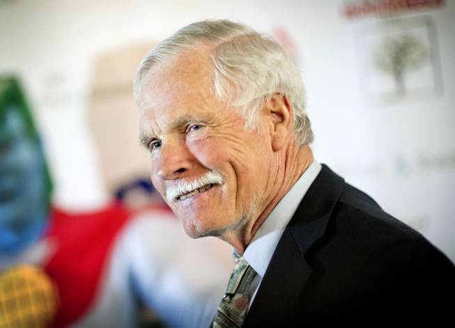 In this Friday, Dec. 6, 2013, file photo, American media mogul Ted Turner is photographed on the red carpet at the Captain Planet Foundation benefit gala in Atlanta.