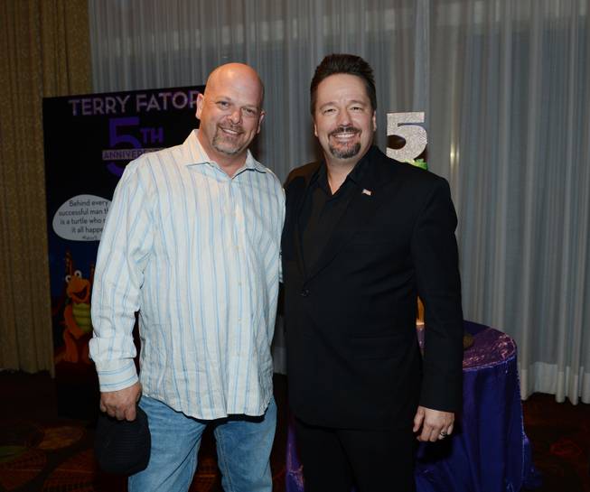 Rick Harrison and Terry Fator at Fator’s fifth-anniversary celebration Friday, ...