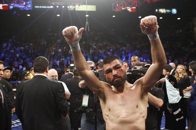Alfredo Angulo acknowledged the crowd after being defeated by Canelo Alvarez in their super welterweight fight at the MGM Grand Garden Arena on Saturday, March 8, 2014.