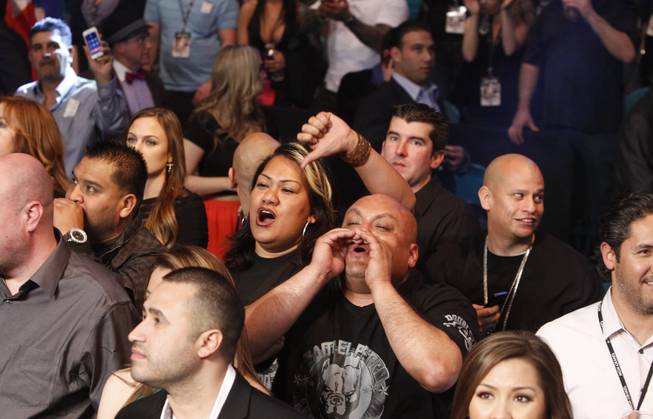 Angry Alfredo Angulo fans show their displeasure after referee Tony Weeks stopped the fight in the 10th round at the MGM Grand Garden Arena on Saturday, March 8, 2014. 