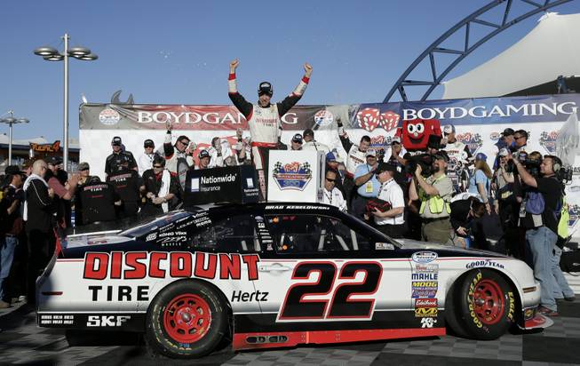 Brad Keselowski celebrates in Victory Lane after winning the NASCAR Nationwide Series auto race Saturday, March 8, 2014, in Las Vegas.