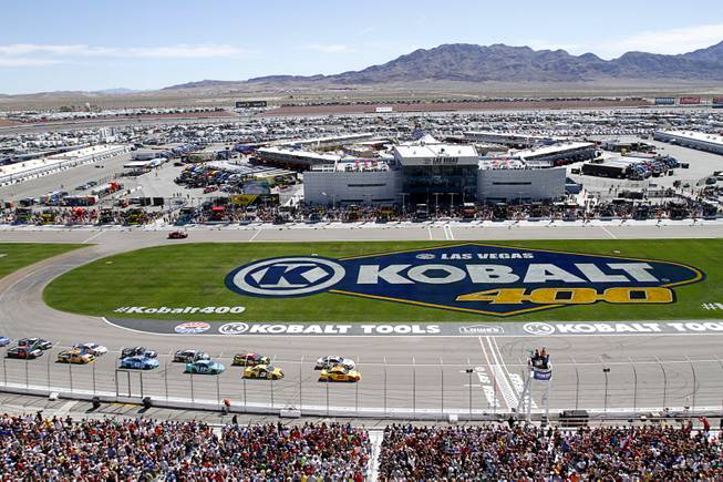 Drivers head to the start line as the Kobalt 400 NASCAR Sprint Cup Series race begins at the Las Vegas Motor Speedway Sunday, March 9, 2014.