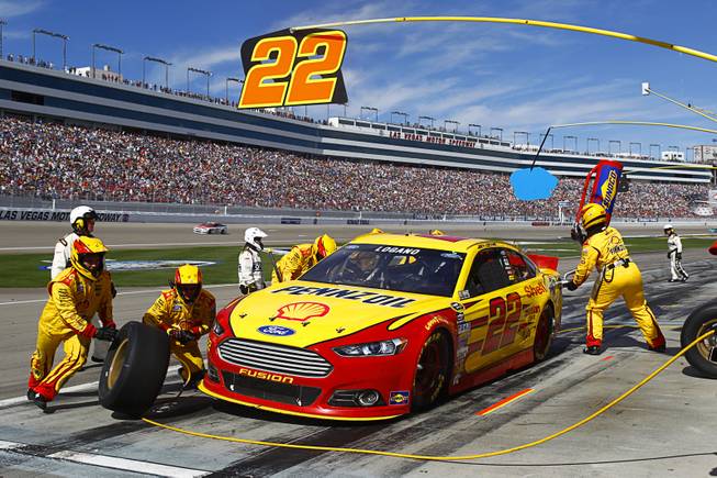 Pole winner Joey Logano comes in for a pit stop during the Kobalt 400 NASCAR Sprint Cup Series race at the Las Vegas Motor Speedway Sunday, March 9, 2014.