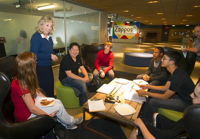 U.S. Congresswoman Dina Titus, standing left, (D-NV) visits a workshop for first annual Congressional Science, Technology, Engineering and Math (STEM) Academic Competition, also known as the House App Contest, at Zappos in downtown Las Vegas Monday, March 10, 2014. The national contest for high school students, established by members of the U.S. House of Representatives in 2013, involves developing an app and creating a video demonstration to explain it.