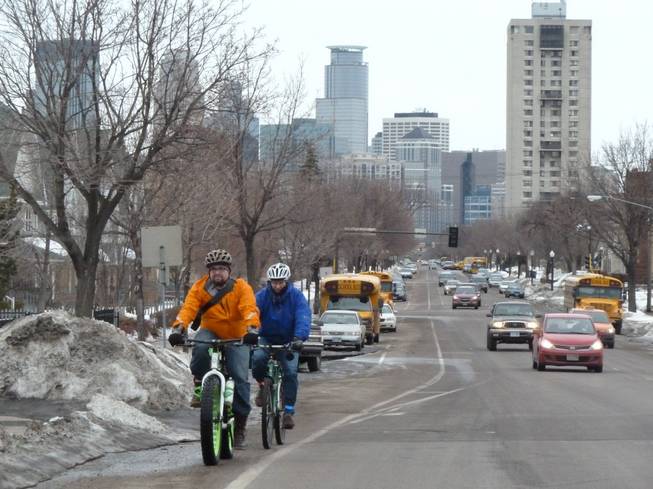 People ride bikes in Minnesota year round. Even in the dead of winter when temperatures go below zero and the snowdrifts dwarf houses. Here, two winter riders, Nick Mason, left, and Dorian Grilley of the Bicycle Alliance of Minnesota, negotiate a road in the winter in Minneapolis, March 11, 2014.