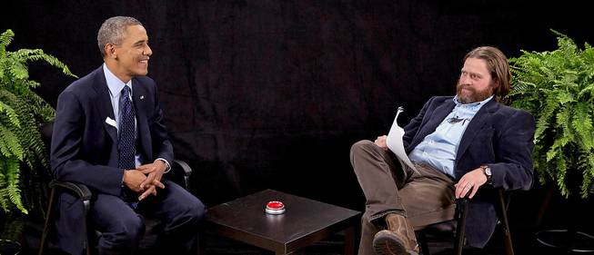 This image from video shows President Obama, left, with actor-comedian Zach Galifianakis during an appearance on "Between Two Ferns," the digital short with a laser focus on reaching people aged 18 to 34.
