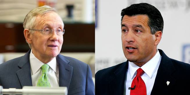 Nevada's political heavyweights, U.S. Sen. Harry Reid, leader of the state's Democrats, left, and Gov. Brian Sandoval, leader of Nevada Republicans, right.