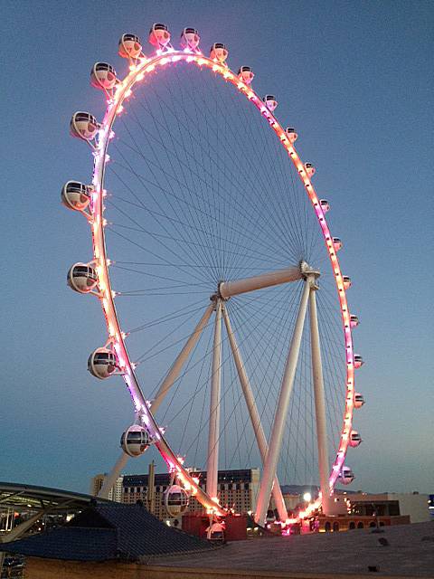 A view of the Las Vegas High Roller observation wheel at dusk, Wednesday, March 12, 2014.