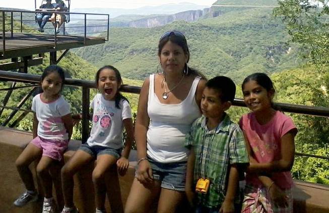 Sandra Ramos poses with her four children in an undated photo. Ramos plans to cross the border from Tijuana to San Diego on March 13, 2014, as part of the "Bring Them Home" event in which more than 30 immigrants without approval will cross into the United States seeking residency or asylum. Three of Ramos' four children are U.S. citizens.
