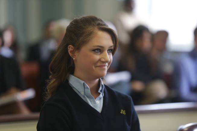 In this Tuesday, March 4, 2014, photo, Rachel Canning smiles during a hearing at Morris County Courthouse in Morristown, N.J.