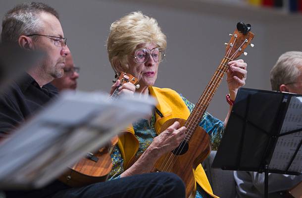 Doug Parsons, left, of Melbourne, Fla., and Marlene Phillips play during a meet up of the Las Vegas Ukulele Club at the Las Vegas Church of the Nazarene Thursday, March 13, 2014. The club meets every Thursday.