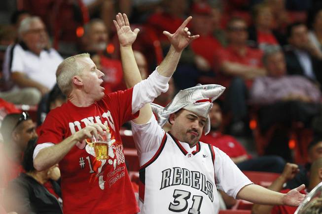 UNLV fans cheer on the Rebels during their Mountain West Conference tournament game against  Wyoming Thursday, March 13, 2014 at the Thomas & Mack Center. UNLV won the game 71-67.