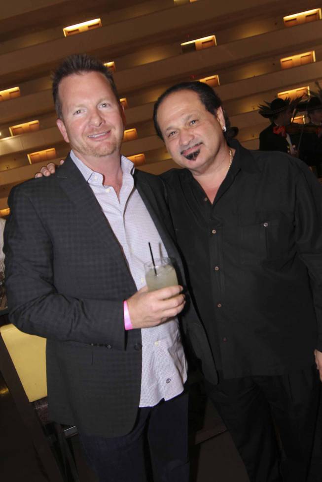 Tim Haughinberry and Michael Fayerverger at the Viva Max! benefit dinner for Max Jacobson hosted at Luxor's Tacos & Tequila restaurant Thursday, March 13, 2014.  All proceeds went toward the recovery of Max Jacobson.