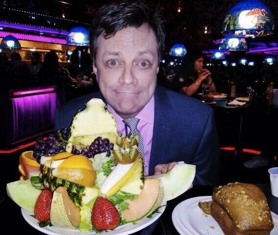 Jim Caruso with a Peppermill fruit salad Wednesday, March 12. 2014.