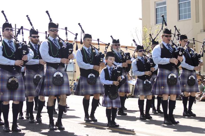 Member of the Desert Skye Las Vegas Pipe Band perform during the annual St. Patrick's Day parade in Henderson Saturday, March 15, 2014.