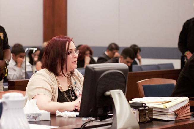 Crystal Hill, mother of victim Jesse Hill who was hit by driver Cristian Diaz while walking with his girlfriend and subsequently died, addresses District Court Judge Jerome Tao during Diaz' sentencing hearing Monday, March 17, 2014. Diaz, 20, pleaded guilty last year to two counts of driving while under the influence of a controlled substance causing death and substantial bodily harm.