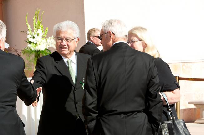 Councilman Bob Coffin greets friends while attending the memorial mass for John Davis "Jackie" Gaughan held at St. Viator Catholic Church in Las Vegas on St. Patrick's Day, March 17, 2014.