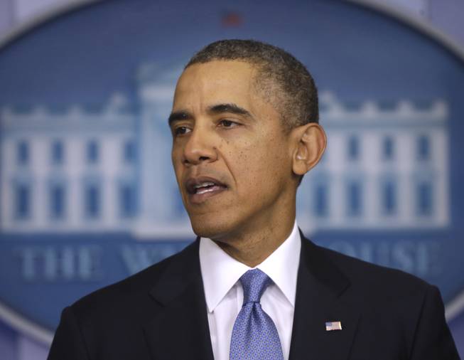 President Barack Obama speaks about Ukraine, Monday, March 17, 2014, in the James Brady Press Briefing Room at the White House in Washington. The president imposed sanctions against Russian officials, including advisers to President Vladimir Putin, for their support of Crimea's vote to secede from Ukraine.
