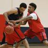 Findlay Prep guard Kelly Oubre knocks the ball out of forward Dillon Brooks' hands during practice Tuesday, March 18, 2014.