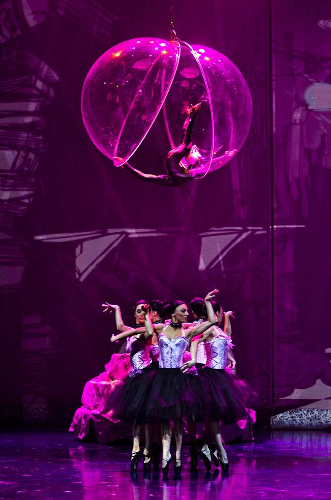 One of many aerialists and dancers during the One Night for ONE DROP dress rehearsal in the Michael Jackson ONE Theatre on Thursday, March 20, 2014.