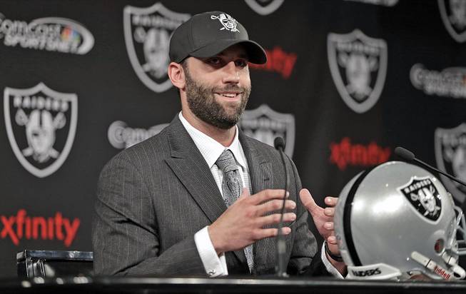 Oakland Raiders quarterback Matt Schaub gestures while speaking during a news conference Friday, March 21, 2014, at the NFL football team's practice facility in Alameda, Calif. 