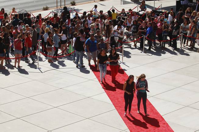 People line up outside Zappos for Las Vegas Prom Closet's "Operation Glass Slipper" Saturday, March 22, 2014.